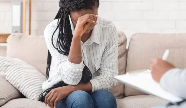 desperate-black-woman-sitting-personal-consultation-psychologist-s-office-depression-concept-closeup-166659489
